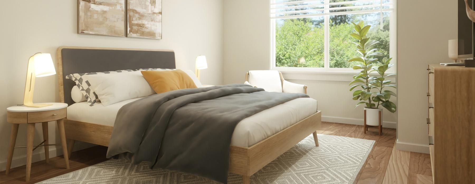a bedroom with a bed and a plant