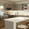 a kitchen with white cabinets