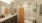a bathroom with a shower and toilet
