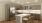 a kitchen with white cabinets