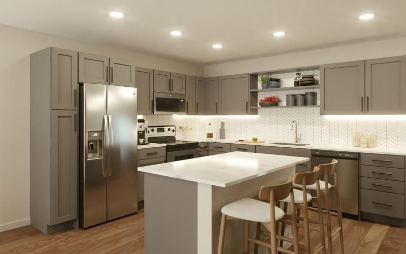 a kitchen with white cabinets