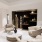 a lounge area with a tv