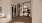 a restroom area with wood floors