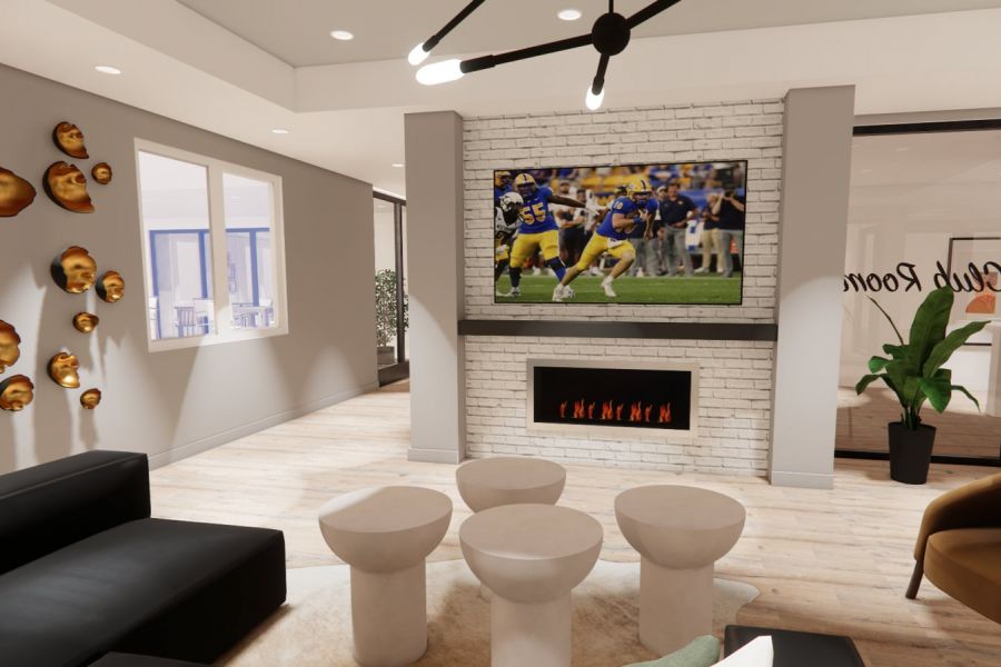 Modern living room with a TV above a fireplace, showing football, and stylish decor including plants and wall art.